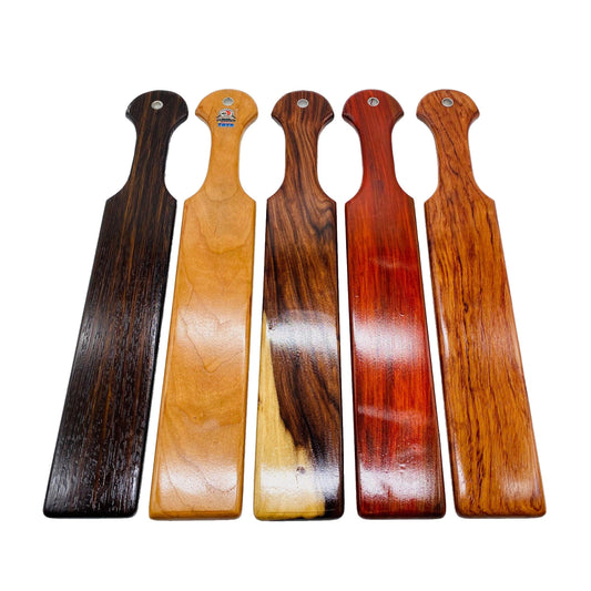 Master Control's Woodshop & Toys's 18" Long Wooden Spanking Paddle - This is a Handmade upon order product. The product usually takes 7-10 days to create. This Long Wooden Spanking Paddle never fails to get an "ouch" of appreciation! Available in several