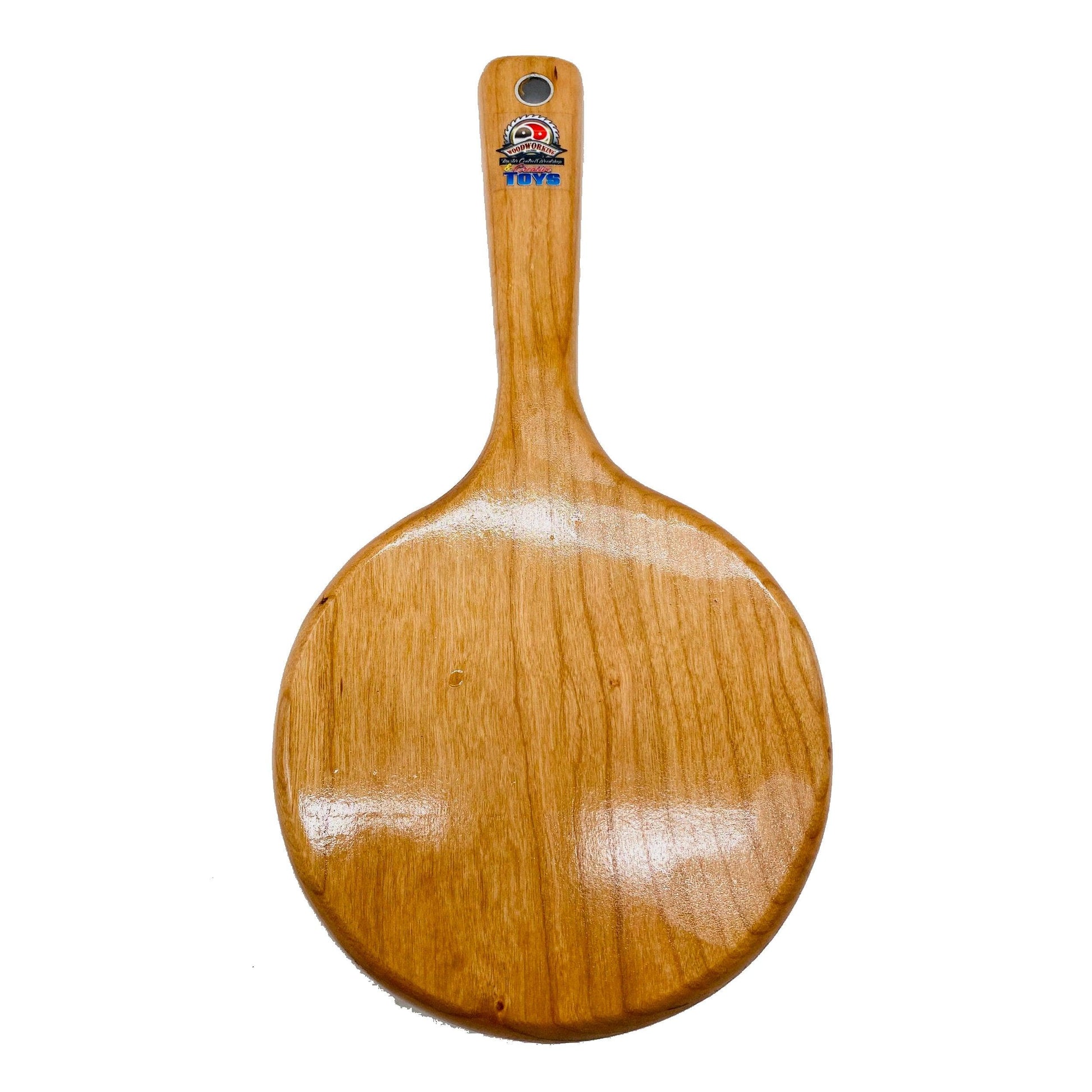 Master Control's Woodshop & Toys's Small Round OTK Spanking Paddle - This is a Handmade upon order product. The product usually takes 7-10 days to create. This Small Round OTK Spanking Paddle never fails to get an "ouch" of appreciation! Available in seve