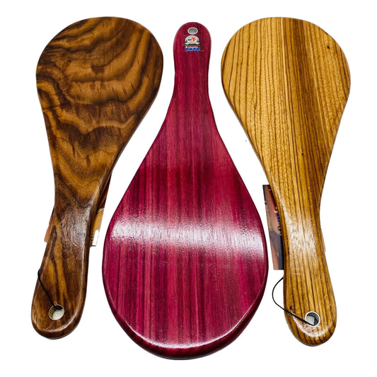 Master Control's Woodshop & Toys's Large Jokari Spanking Paddle - This is a Handmade upon order product. The product usually takes 7-10 days to create. This Large Jokari Spanking Paddle never fails to get an "ouch" of appreciation! Available in several be
