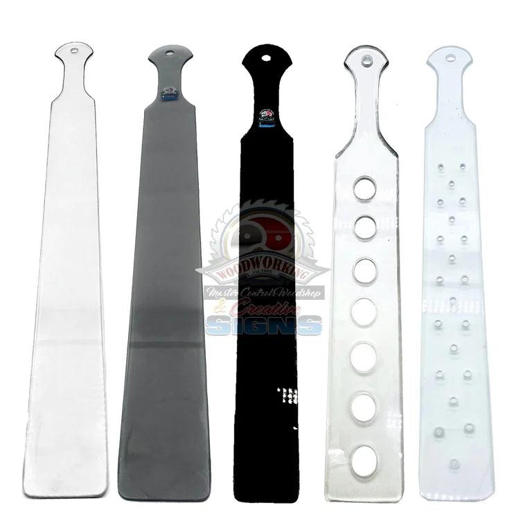 Master Control's Woodshop & Toys's Long Lexan Spanking Paddle - This is a Handmade upon order product. The product usually takes 7-10 days to create. This Long Lexan Spanking Paddle never fails to get an "ouch" of appreciation! Available in several beauti