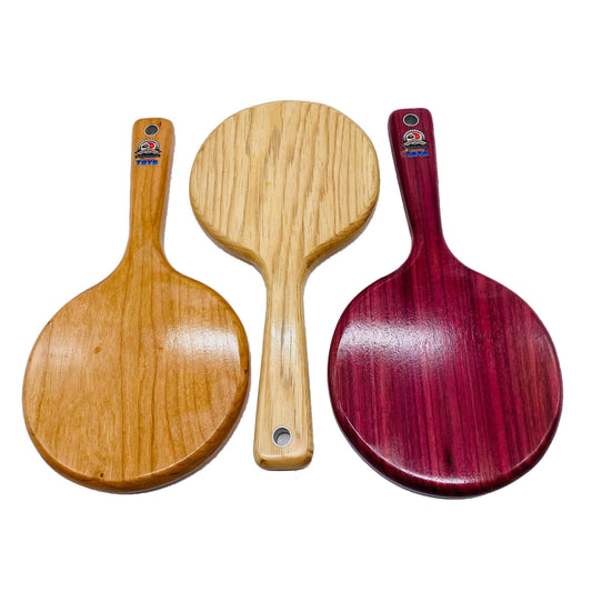 Master Control's Woodshop & Toys's Small Round OTK Spanking Paddle - This is a Handmade upon order product. The product usually takes 7-10 days to create. This Small Round OTK Spanking Paddle never fails to get an "ouch" of appreciation! Available in seve