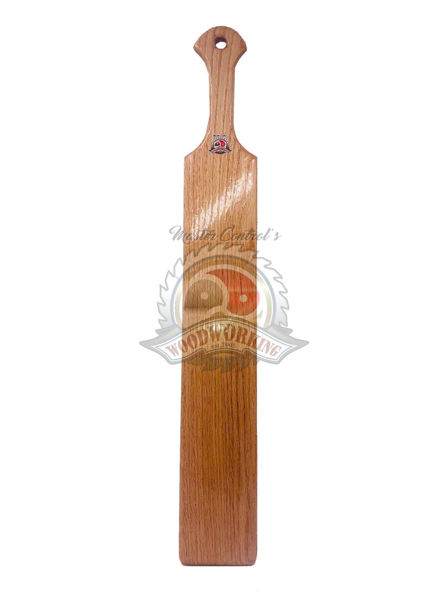 Master Control's Woodshop & Toys's 22" Long Wooden Spanking Paddle - This is a Handmade upon order product. The product usually takes 7-10 days to create. This Long Wooden Spanking Paddle never fails to get an "ouch" of appreciation! Available in several