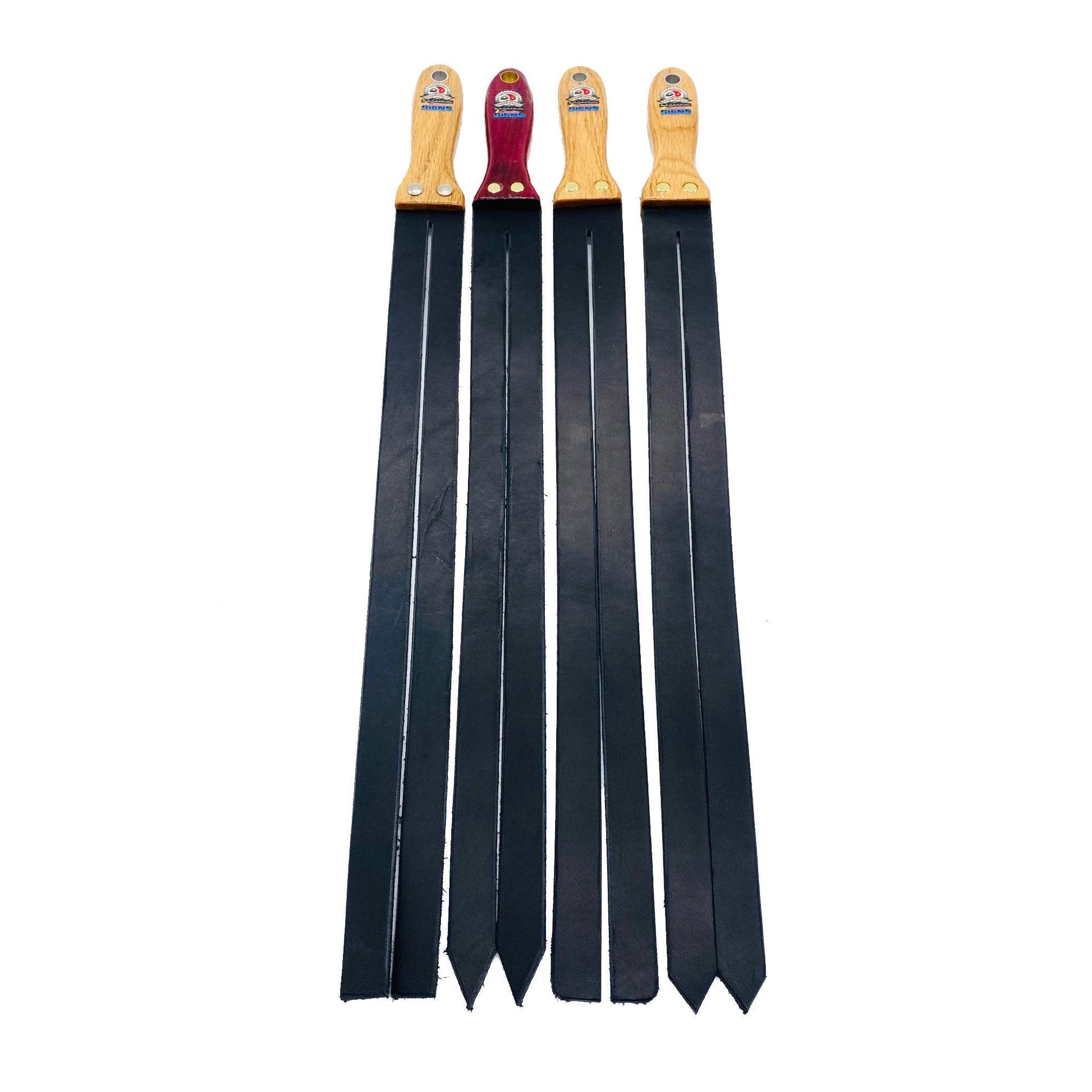 Master Control's Woodshop & Toys's Italian Leather Double Tawse Spanking Paddle - This is a Handmade upon order product. The product usually takes 7-10 days to create. This Italian Leather Double Tawse Spanking Paddle never fails to get an "ouch" of appre