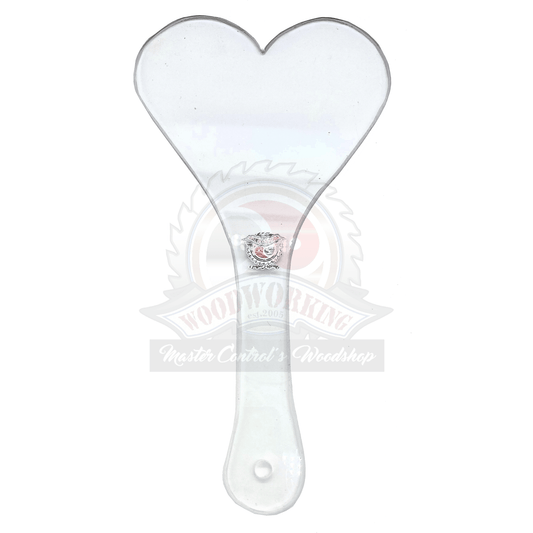 Master Control's Woodshop & Toys's Large Lexan Heart Spanking Paddle - This is a Handmade upon order product. The product usually takes 7-10 days to create. This Large Lexan Heart Spanking Paddle never fails to get an "ouch" of appreciation! Available in